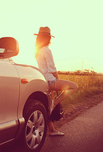 istock Young woman on road trip looking away 504126040