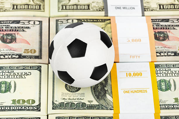 istock Money and soccer ball 504127792