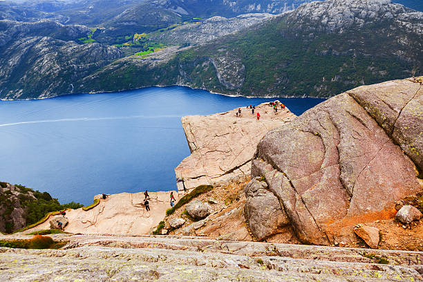 Preachers Pulpit Rock in fjord Lysefjord - Norway Preachers Pulpit Rock in fjord Lysefjord - Norway - nature and travel background norway lysefjorden fjord norwegian currency stock pictures, royalty-free photos & images