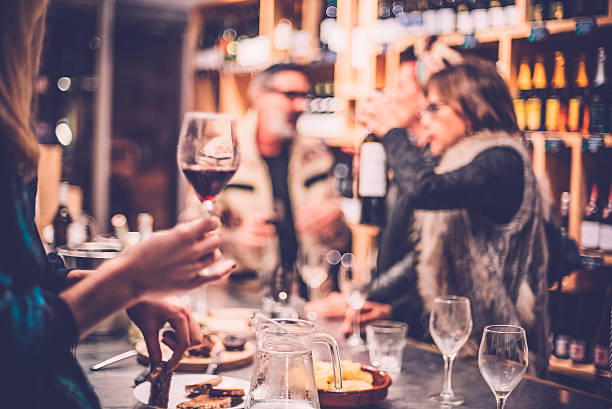 istock People Having Fun in a Wine Bar 504129386
