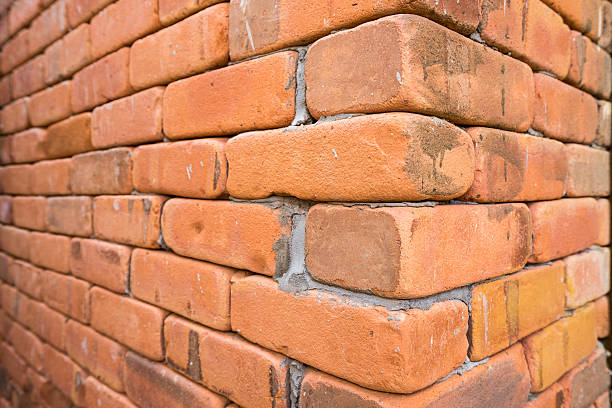 istock side view of the grunge red brick wall background 504130904