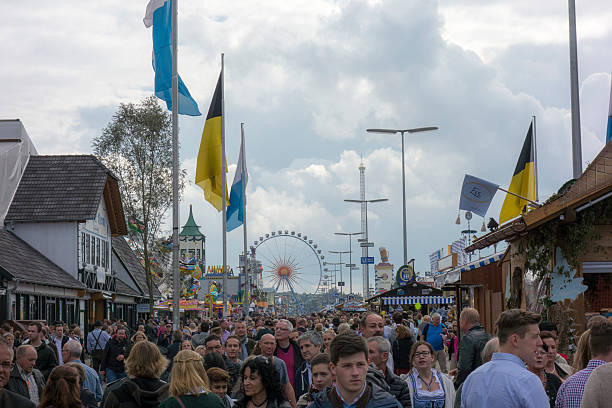 Munich, Germany - September 20, 2015: Crowd at the Oktoberfest in Munich. The Oktoberfest is the biggest beer festival of the world with over 6 million visitors each year. Foto taken from Theresienwiese.