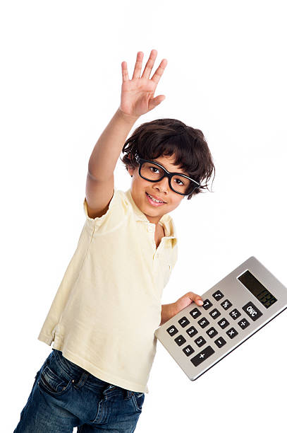 istock Cute Mixed Race Boy with Calculator. 504131927