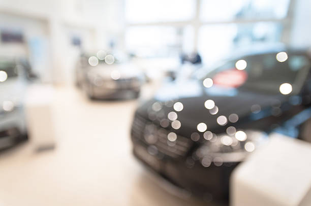 blurred  new cars dealership place stock photo