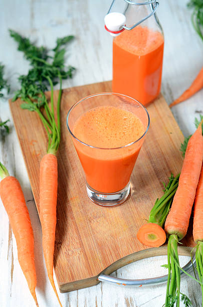 istock Carrot juice in glass 504134782