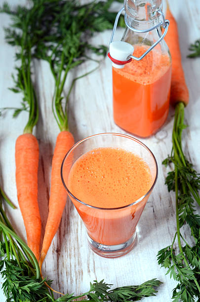 istock Carrot juice in glass 504134818