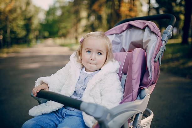 istock young family walking in the park 504135350