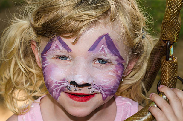 istock girl with face painting 504135959