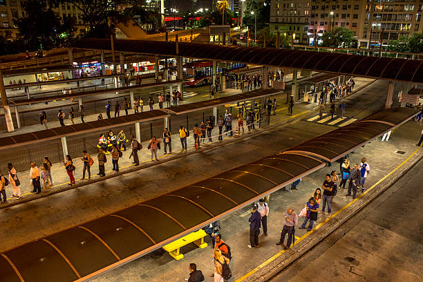 bus terminal Sao Paulo, Brazil, december 09, 2015: View of people waiting for urban buses in Bandeira Bus Terminal at night, São Paulo, Brazil Anhangabáu stock pictures, royalty-free photos & images