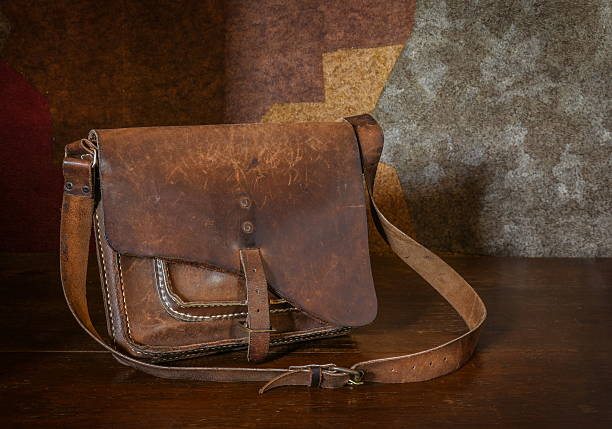 istock Leather bag. Vintage rustic leather bag,still life. 504182588