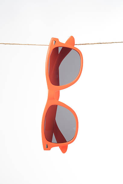istock Sunglasses hanging from a rope 504182702