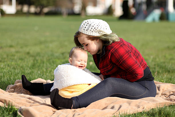 Teen bonding with her baby boy.