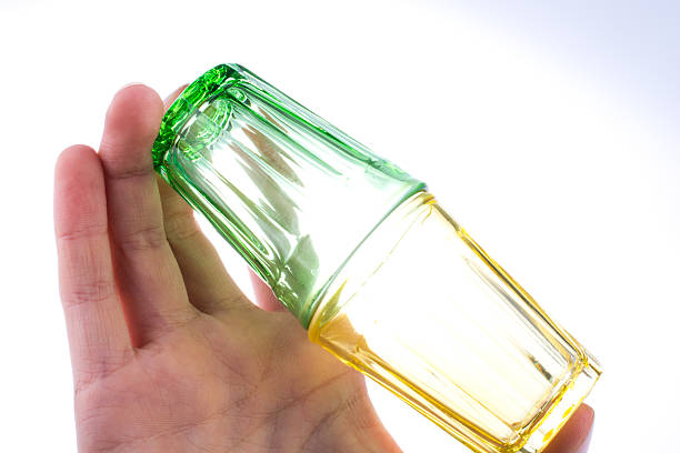 istock colorful drinking glass in hand 504188702
