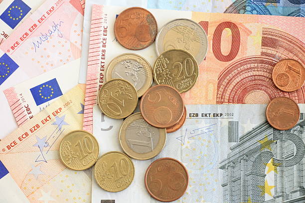 istock Money euro coins and banknotes 504188726