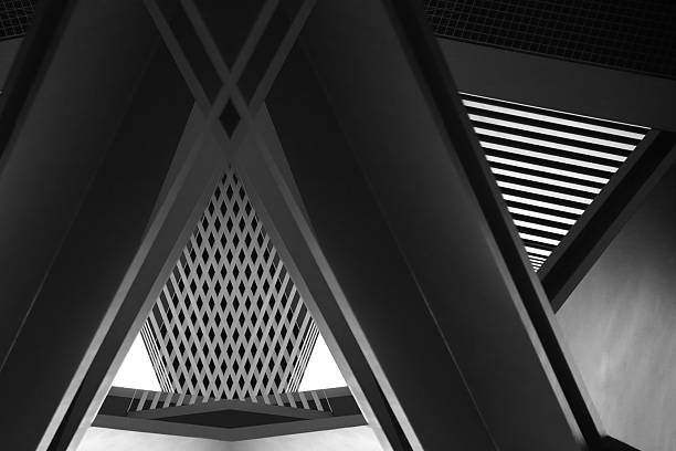 istock Double exposure close-up of architectural fragment with complex geometric structure 504189430