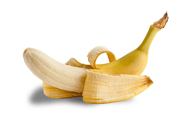 istock half-peeled banana on white 504192258