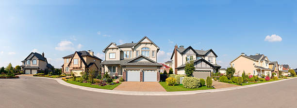 Brand new suburban house in sunny summer afternoon stock photo
