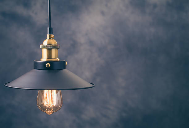 istock Retro light lamp at left of gray background 504223868