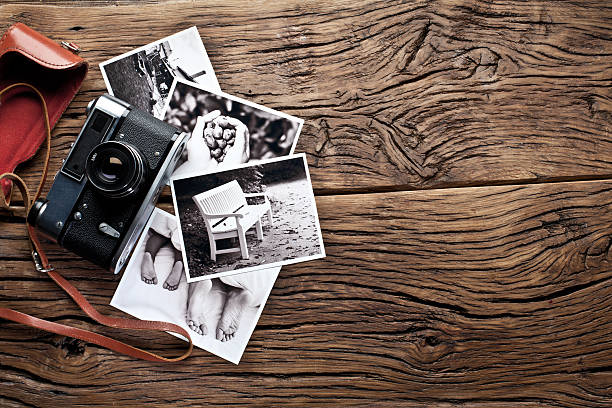 istock Old rangefinder camera and black-and-white photos. 504225198