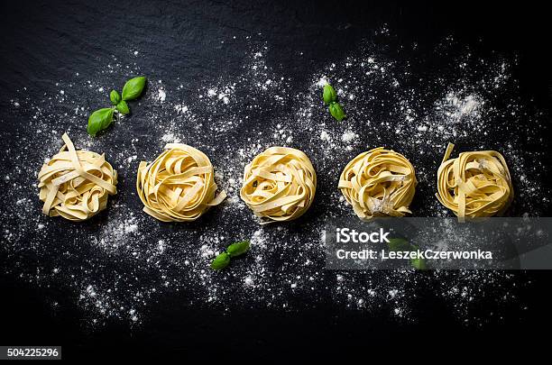 Pasta On Dark Background Stock Photo - Download Image Now - Pasta, Italy, Italian Culture