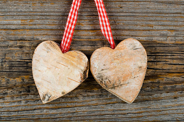 istock Two wooden hearts 504227428
