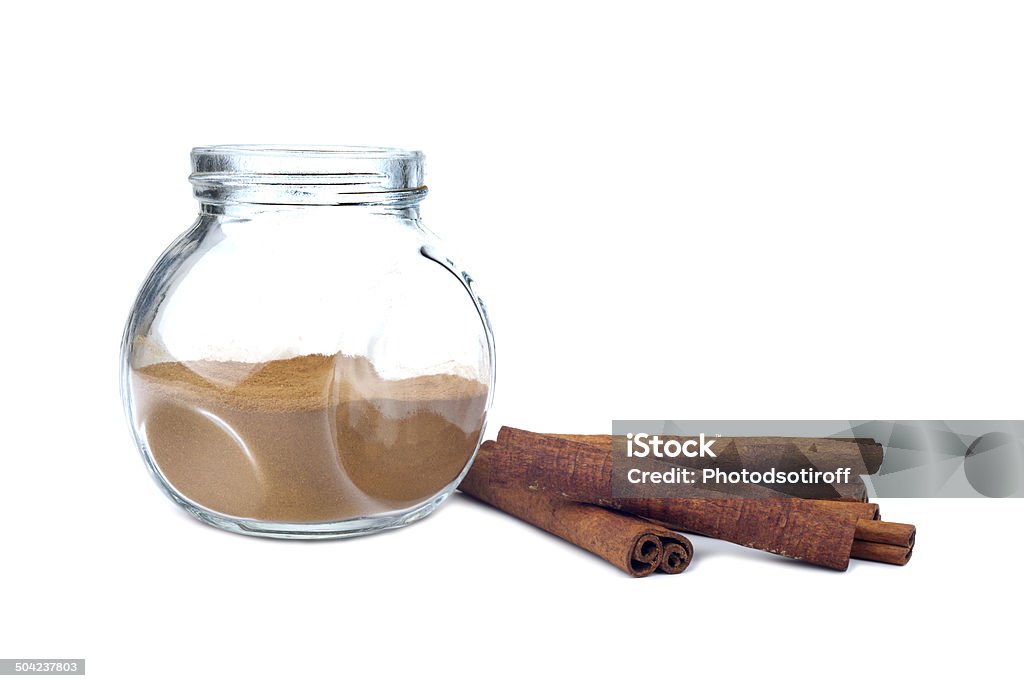 jar with cinamon, isolated on white background Brown Stock Photo