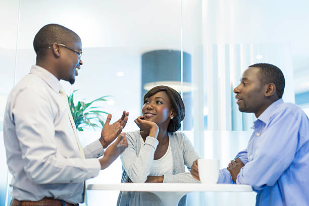istock African business colleagues having a conversation in the kitchen. 504238785