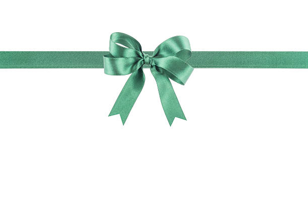 istock Green ribbon with a bow on white background 504239379