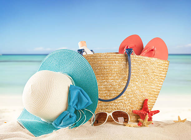 istock Sandy beach with accessories and blur sea 504240089