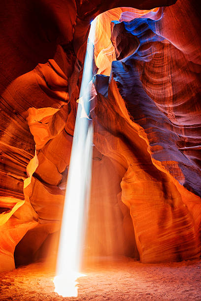 Light Beam at Upper Antelope Canyon in Arizona, USA Light beam in Upper Antelope Canyon. The canyon is part of a series of slot canyons on Navajo land in Arizona, USA. upper antelope canyon stock pictures, royalty-free photos & images