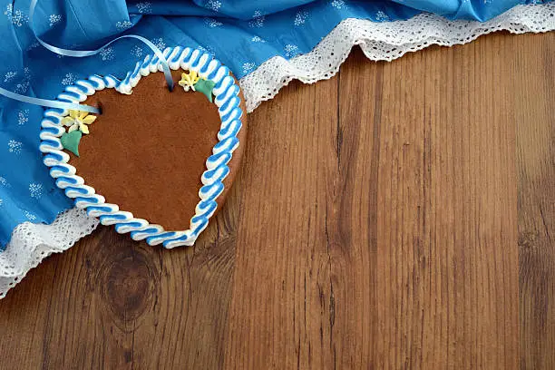copy space Beer Fest Dirndl in blue white with gingerbread heart. Shopping background.