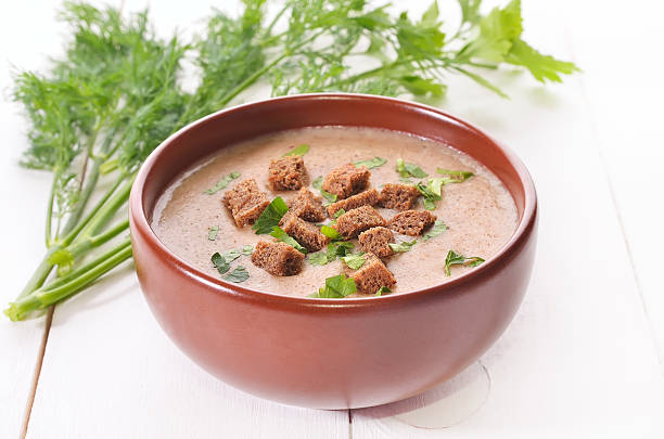 istock Bread soup with croutons and herbs 504242473