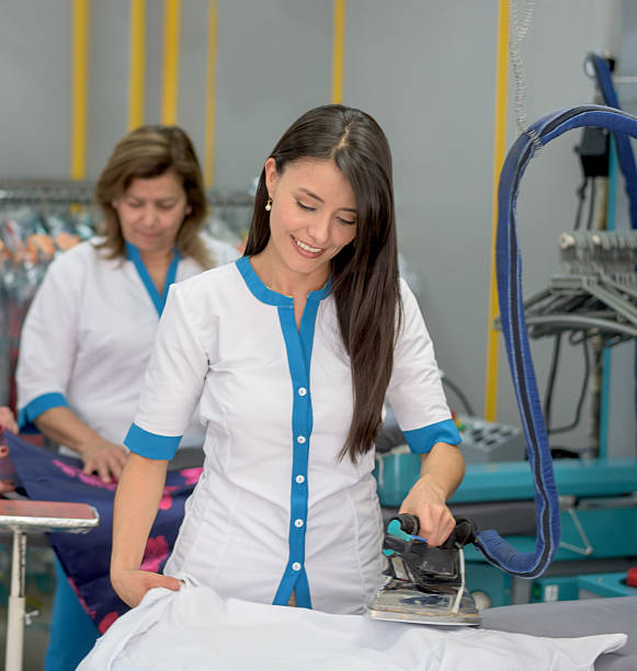istock Women working at a laundry shop 504243862