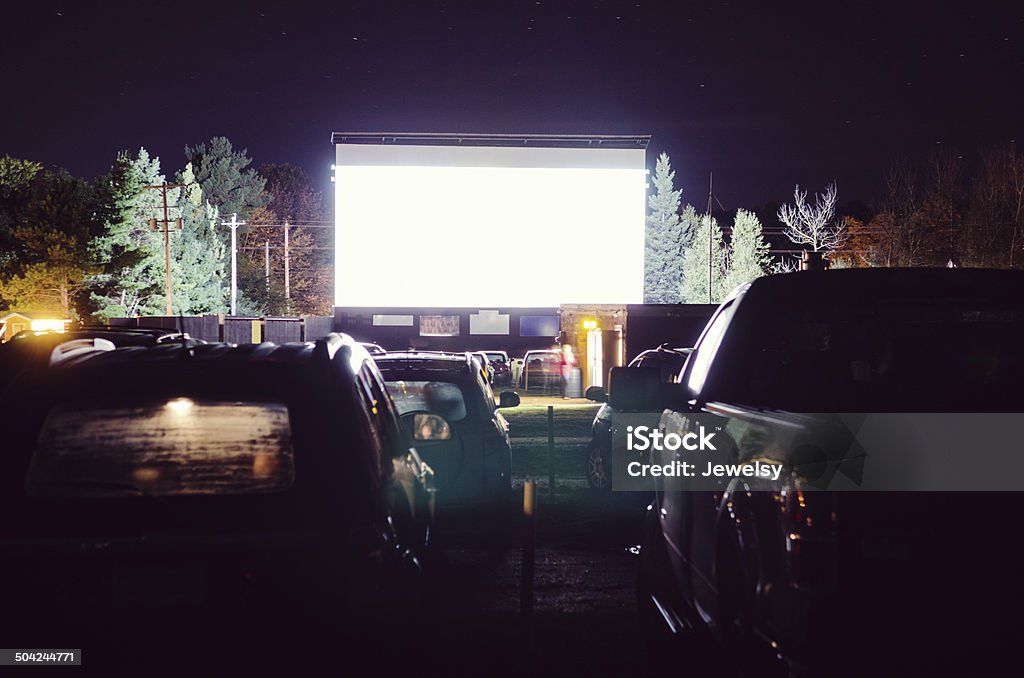 Drive-in Movie Fogged up cars parked at a drive-in movie theatre with blank screen Drive-in Movie Stock Photo