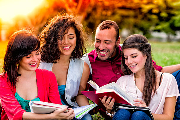istock Multi-ethnic group of young students sharing at university campus 504248408