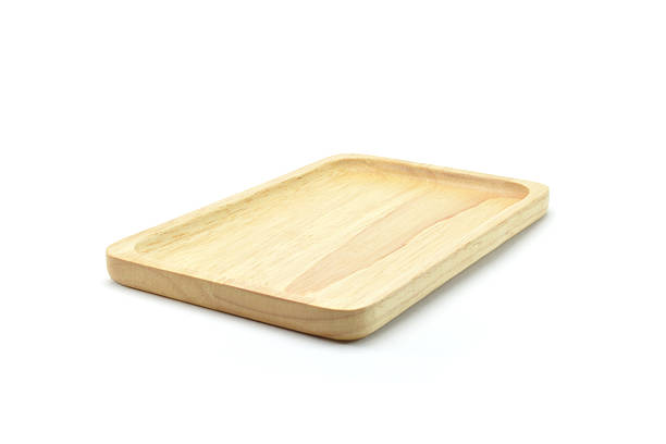 istock wooden plates on white background 504251420