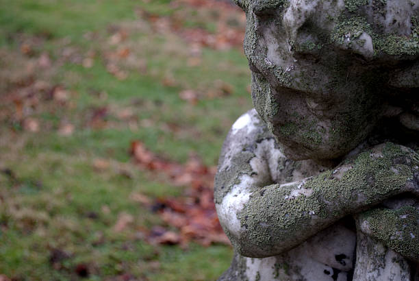 istock Old Statue of a Child 504252676