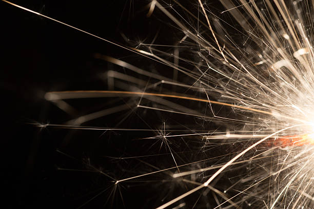 istock Christmas Celebration Sparkler Black Background 504252930