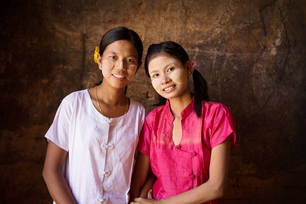 istock Two young Myanmar female smiling 504253740