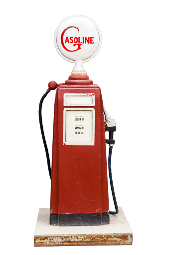 Gas station with two nozzle fuel pumps. Close-up and selective focus