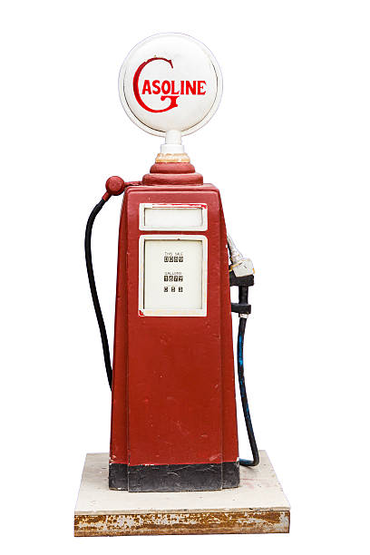 vintage gas pump The aged and worn vintage gas pump isolated on white with cliping path vintage gas pumps stock pictures, royalty-free photos & images
