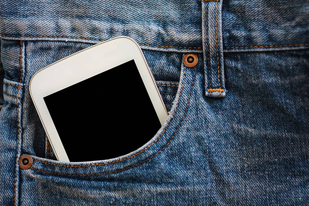 istock mobile phone in jeans pocket with black screen 504256038