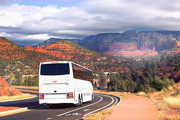 istock White tourists bus cornering in Sedona 504256316