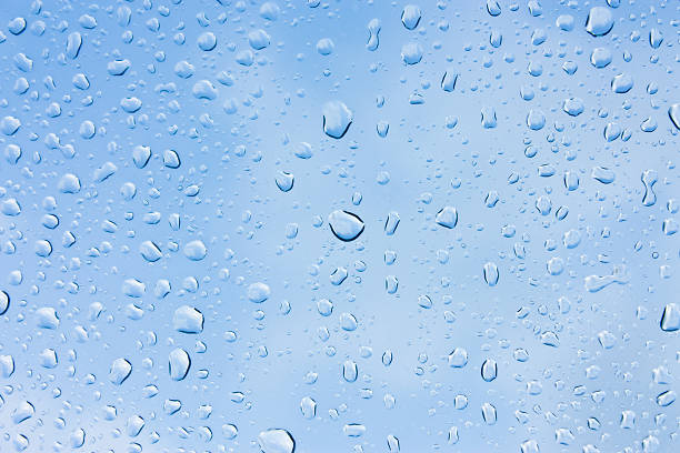istock Drops of rain on glass , rain drops on clear window 504257596