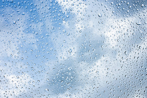 istock Drops of rain on glass , rain drops on clear window 504257602