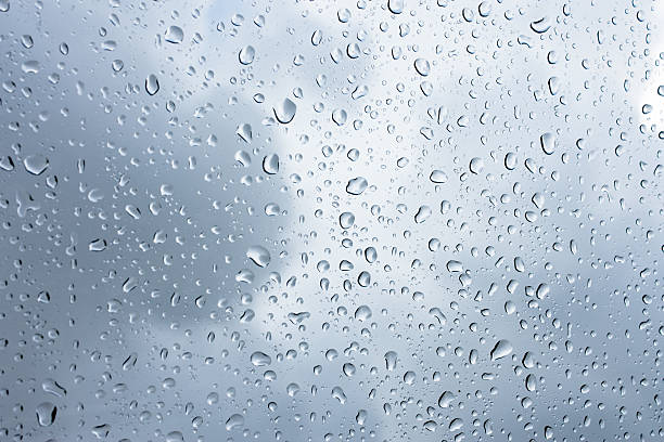 istock Drops of rain on glass , rain drops on clear window 504257630