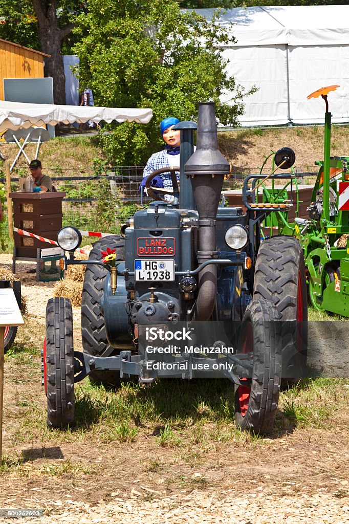 old tractors at the Hessentag Oberursel, Germany - June 12, 2011: old tractors at the Hessentag in Oberursel, Germany. Hessentag is a big festival to present a city in the county of Hesse in Germany. 2011 Stock Photo