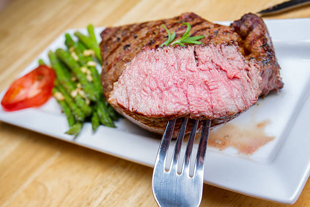 istock Big Rib Eye Beef Steak With Bite Cut Out 504265253