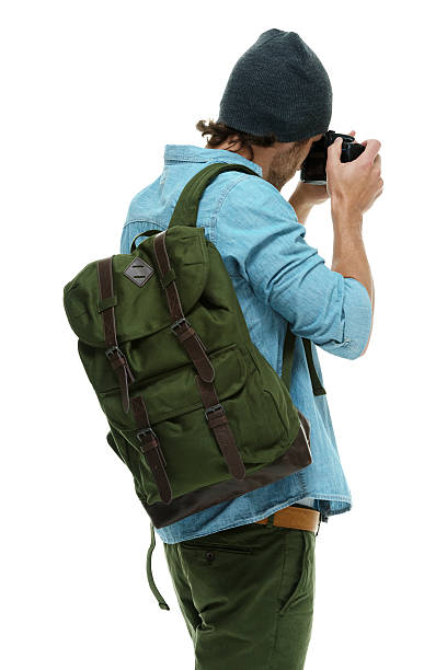 istock Rear view of photographer standing 504267735