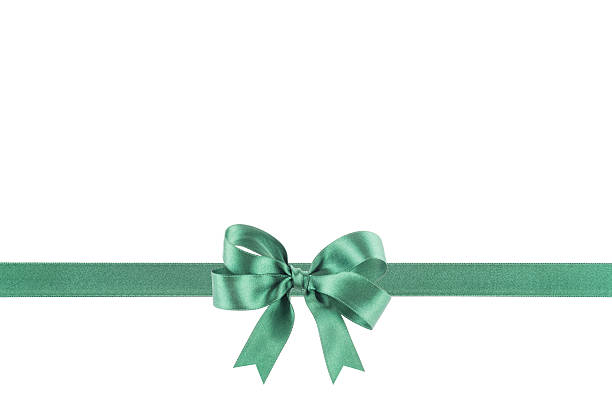 istock Green ribbon with a bow on white background 504268349